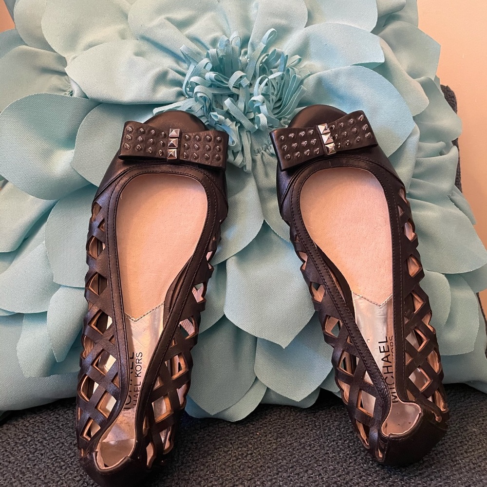 Black flats by Michael Kors